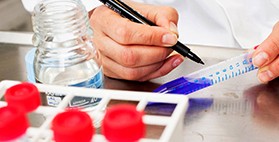 Doctor preparing treatments for clinical trial